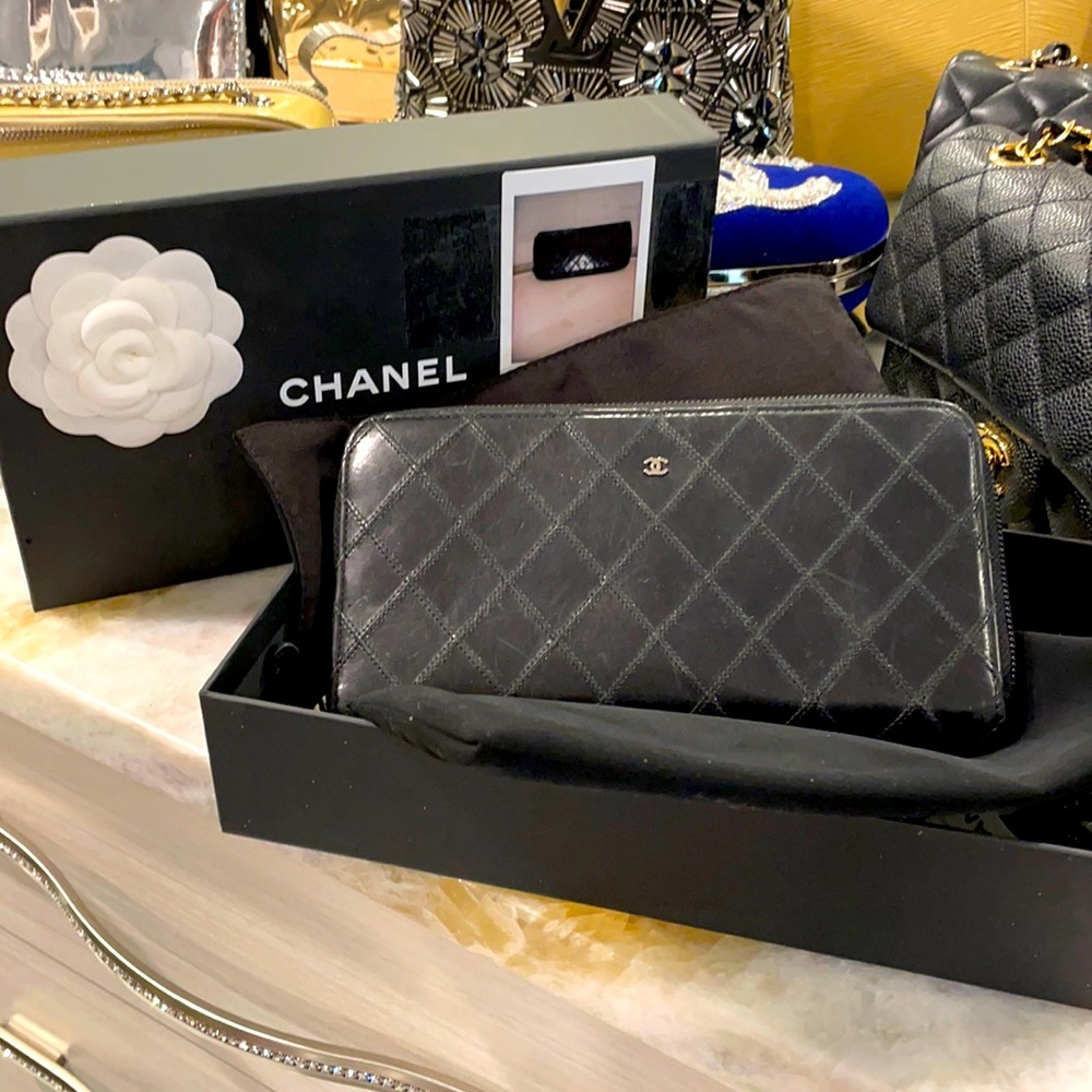 Chanel Zip Around Long Wallet in black lamb